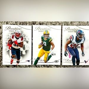 Christian Watson, Ed Reed & Rhamondre Stevenson 2023 Prestige football cards